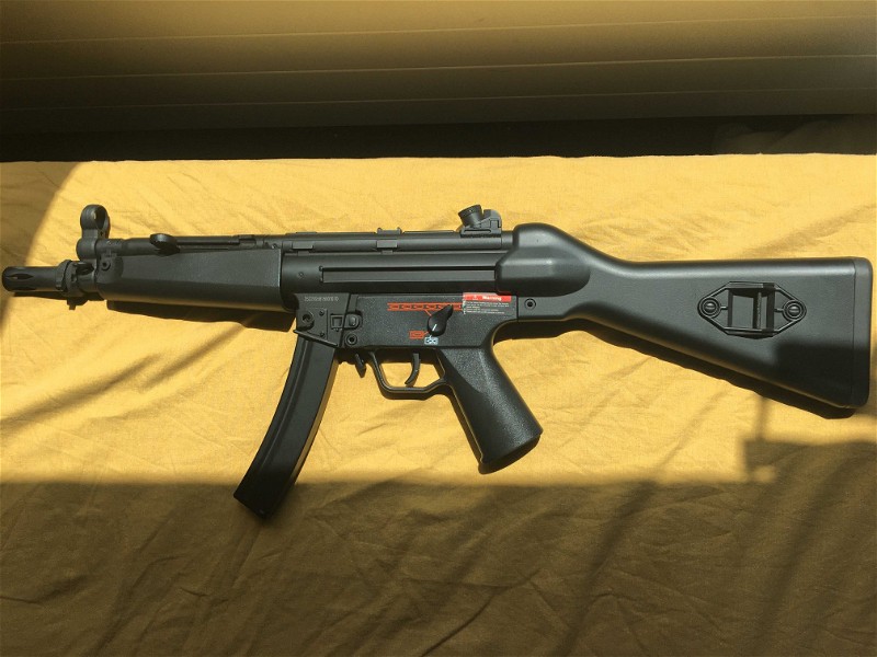 Afbeelding 1 van Nieuwe JG MP5 AEG incl. red dot, NiMh accu,hicap mag & oplader