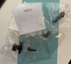 Imagen para KWA/ASG MP9 Original Ersatzteile Hammer/Abzugseinheit