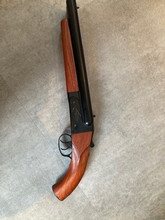 Afbeelding van shotgun (short) met de twee originele shells