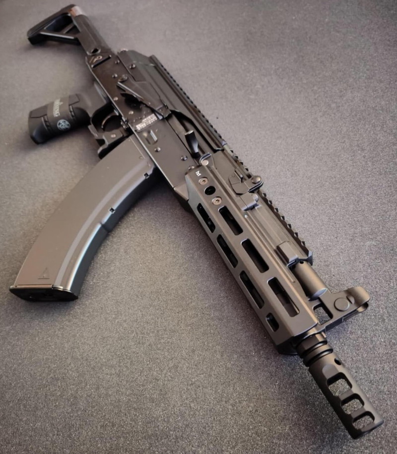 Image 1 for Gloednieuwe Tokyo Marui  AKX GBBR  + 3 mags + speedloader adaptor