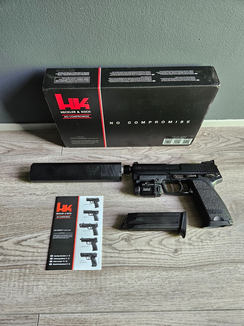 Imagen 1 de KWA HK USP.45 Tactical + silencer + TRL-7 lamp