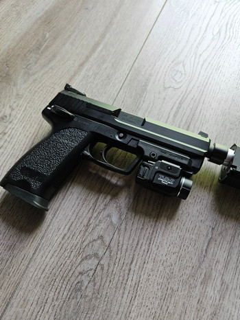 Imagen 5 de KWA HK USP.45 Tactical + silencer + TRL-7 lamp