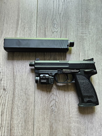 Imagen 8 de KWA HK USP.45 Tactical + silencer + TRL-7 lamp