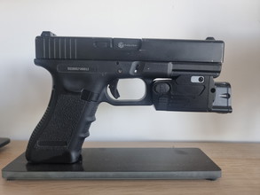 Image for Evolution Glock 17 pistol + case + stand + combined laser and tactical light.