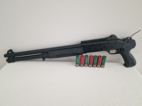 Bild für Shotgun met 5 shells