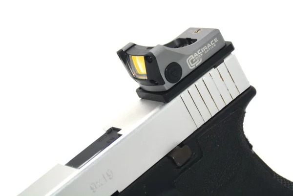 Image 1 pour Nieuwe Aim-O M1 red dot. Ongebruikt, inclusief universal mount.