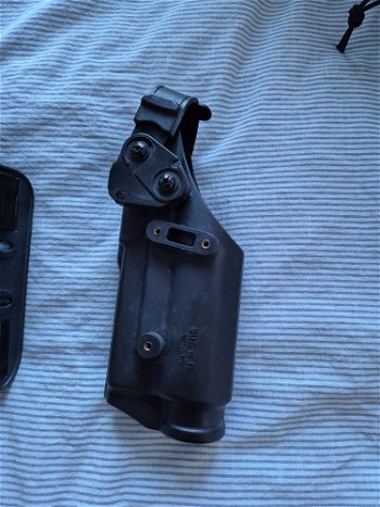 Image 2 for SAFARILAND Glock 17 met Surefire X200 lamp holster en been adapter