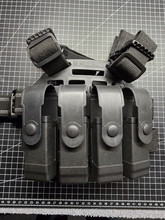 Bild für BLACKHAWK - PORTE CUISSE RIGIDE AVEC 4 PORTE-MAGASINS POUR PISTOLET