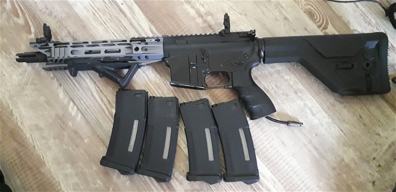 Image 1 for Custom wolverine m4 plus 4 mags singel shot only