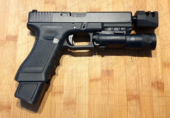 Image 2 for Evolution glock met Ballerina demper en surefire light
