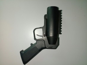 Imagen para 2. Hand grenade launcher + 2 CO2 grenades + CO2 Syringe loader + leg holster + bag of caps - 100 euro