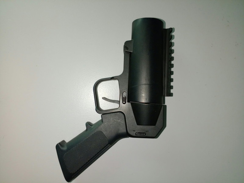 Image 1 for 2. Hand grenade launcher + 2 CO2 grenades + CO2 Syringe loader + leg holster + bag of caps - 100 euro