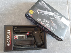 Afbeelding van Tokyo Marui Hi capa 5.1 in nieuwstaat met extra magazijn en nuprol holster