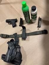 P99 compact met accessoires képe