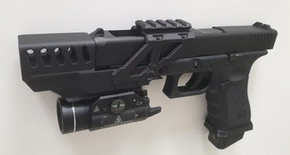 Afbeelding van glock 34 deluxe editiom met silencer and light