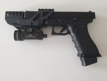 Afbeelding 6 van glock 34 deluxe editiom met silencer and light