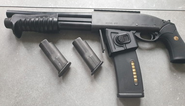 Image for M870 Breacher Gas Shotgun | Tokyo Marui met M4  adapter