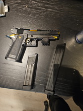 Afbeelding van TM Gold Match met magazijn + extended mag. 1 Skirm mee gespeeld.