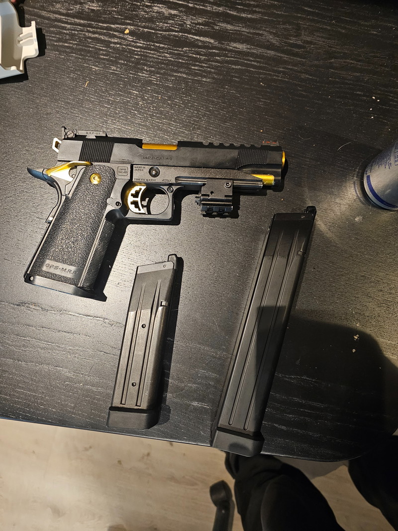 Afbeelding 1 van TM Gold Match met magazijn + extended mag. 1 Skirm mee gespeeld.