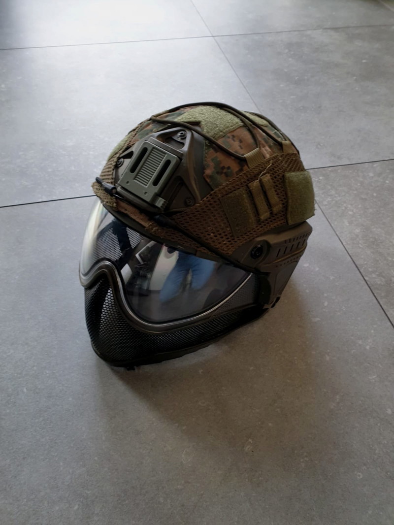 Imagen 1 de Groene olive WARQ  helm met wit vizier en camo