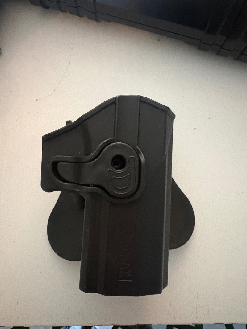 Image 1 for Amomax paddle holster P320