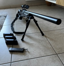 Image pour Un sniper et 2 pistolets