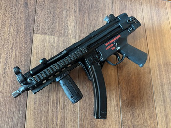 Imagen 6 de WE Apache klapkolf voor MP5, UMP-style