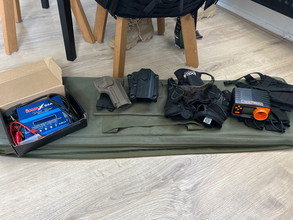 Image pour Airsoft spulletjes teab! Chrono, lader, plate carrier etc