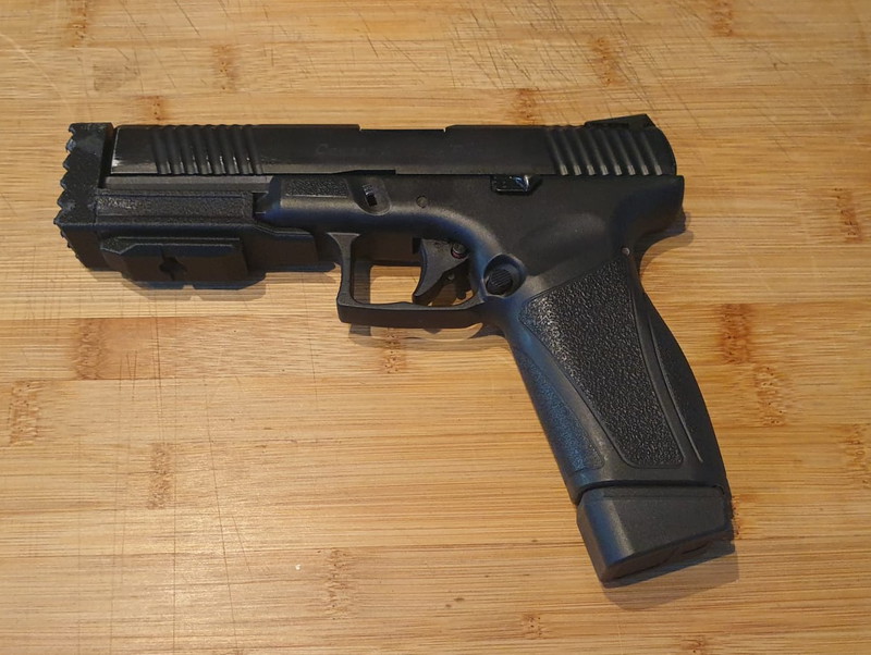 Image 1 for Combat Adaptive Pistol met scary supressor