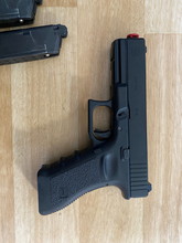 Image pour Glock met 3 mags!