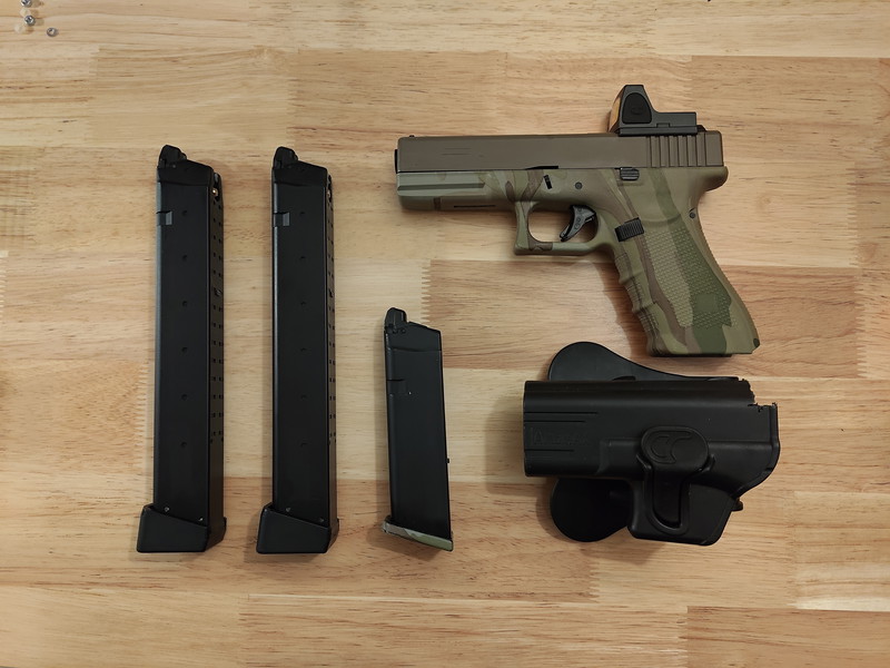 Afbeelding 1 van Raven G17, red dot, 3x mags (2x extended), left handed holster