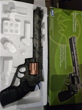 Afbeelding van Multicam black revolver komt met 6 schels en lader