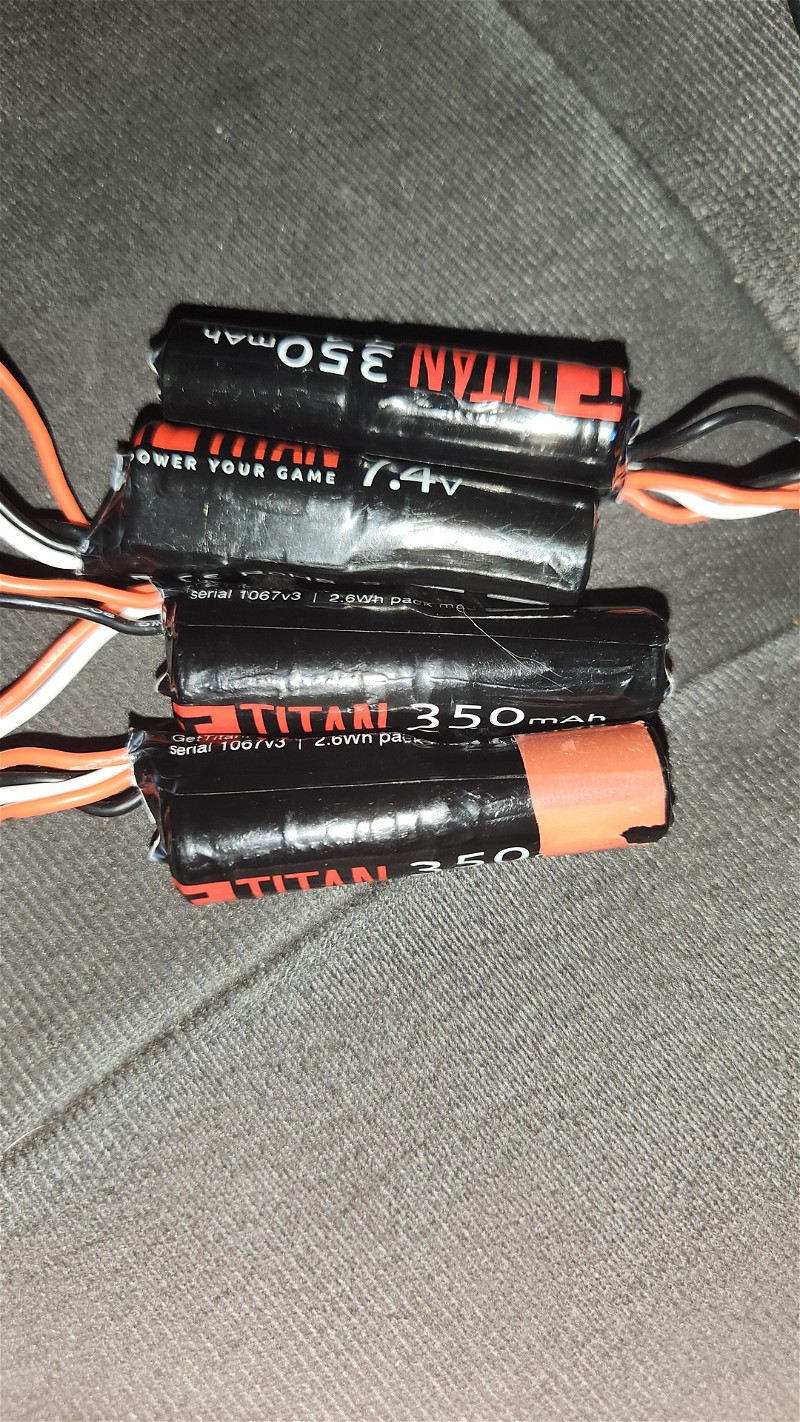 Afbeelding 1 van 4x titan batterij met lader