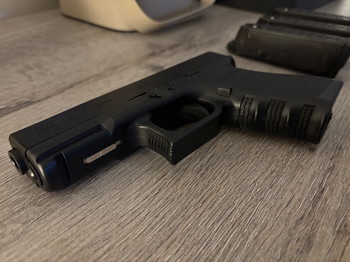 Bild 3 für Tokyo Marui Glock 19 Gen3 incl 3 mags / Mag pouch