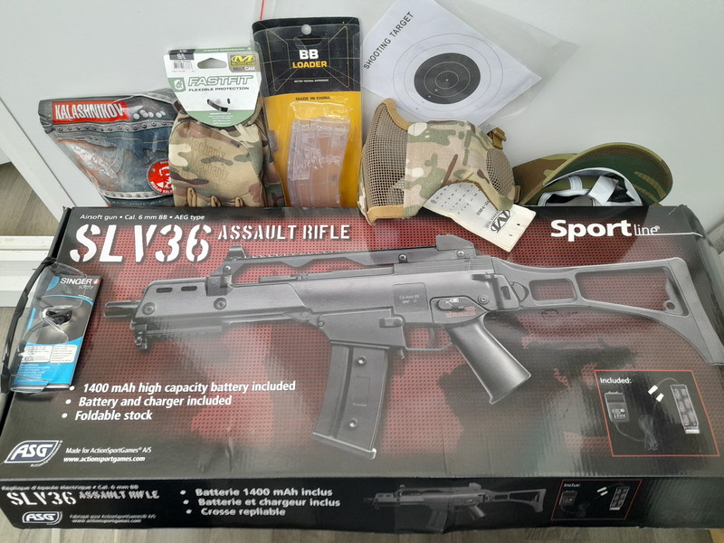 Image 1 pour Vend réplique airsoft AEG SLV36 ou G36 noir neuf jamais utilisé garantie plus équipement neuf jamais utilisé garantie