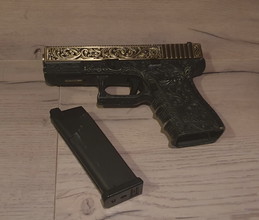 Image for WE Glock 17 Engraved Gold/Black